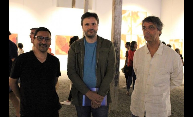 José Manuel Jiménez, Jorge Larraín y Hernán Cruz, expositor.